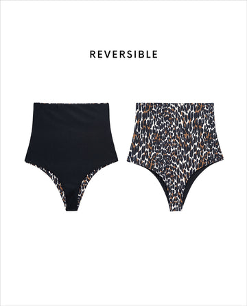 THE GREAT. SP25 SWIM's The Reversible High Rise Brief in Leopard and Black is shown; one side features classic solid black, while the other displays a bold leopard print.
