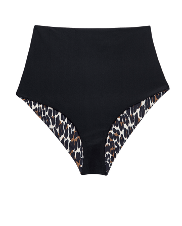 The Reversible Mid Rise Brief by THE GREAT. SP25 SWIM features a solid black exterior with a leopard and black print lining that peeks out at the leg openings.
