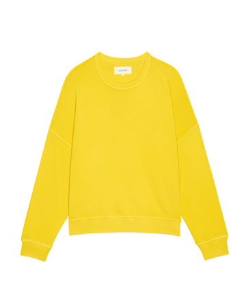 The Teammate Sweatshirt in Daffodil by THE GREAT. SP25 KNITS features long sleeves and ribbed cuffs, ideal for casual wear enthusiasts.