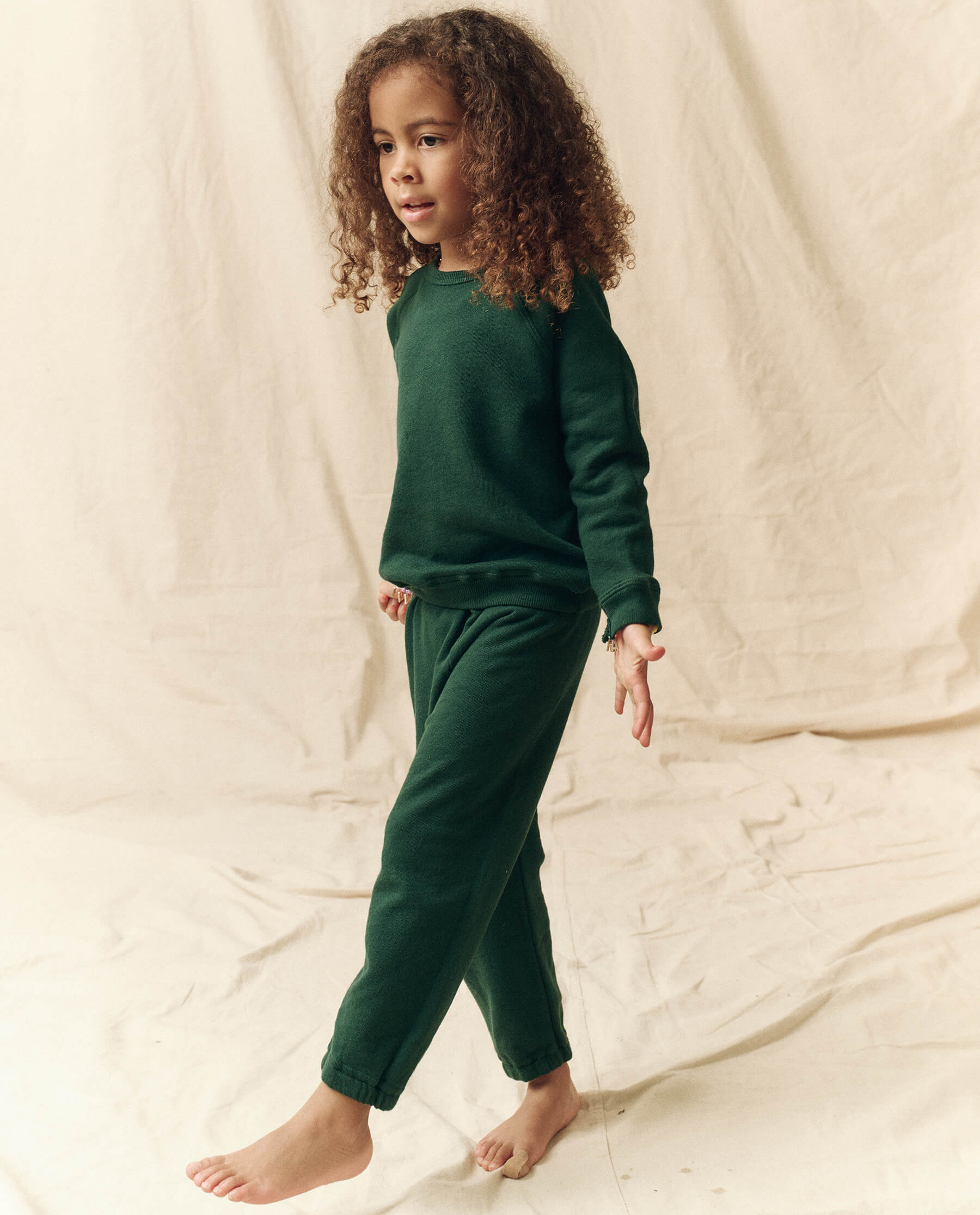 The Little Stadium Sweatpant. Solid -- Green Grove SWEATPANTS THE GREAT. FALL 23 LITTLE