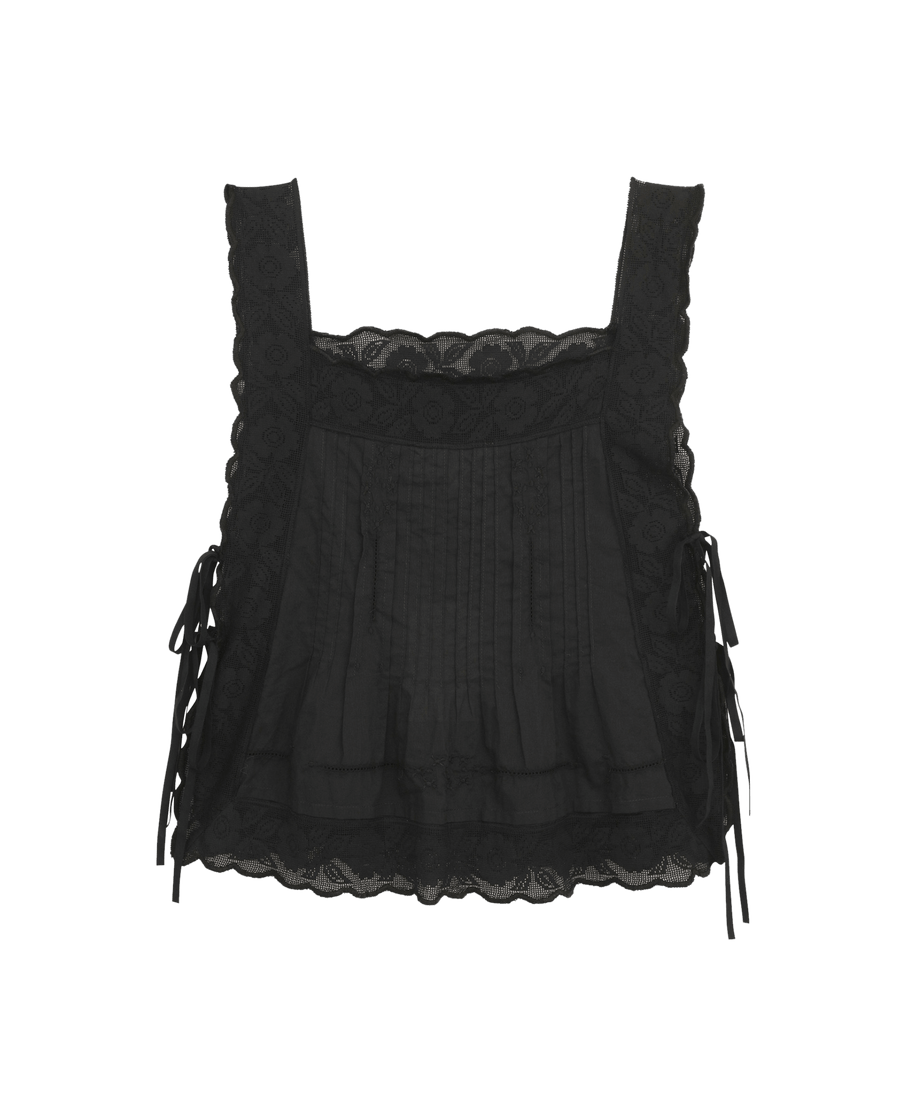 The Attic Lace Cami by THE GREAT. SU25 features a black square neckline, lace details, side ribbon ties, and a scalloped hem—an elegant addition to any wardrobe.