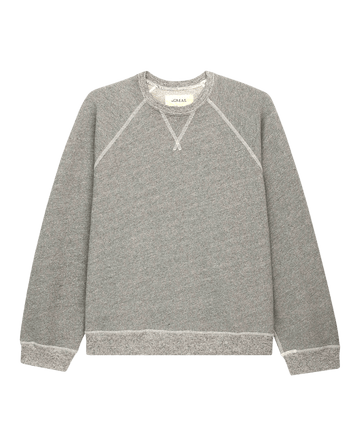 The Slouch Sweatshirt by THE GREAT. CORE KNITS in Varsity Grey showcases a vintage crewneck design with slouchy sleeves and ribbed cuffs and hem, elegantly displayed on a white background.