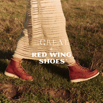 Person walking on grass wearing brown boots and a beige crochet skirt with "Great & Red Wing Shoes" text overlay.