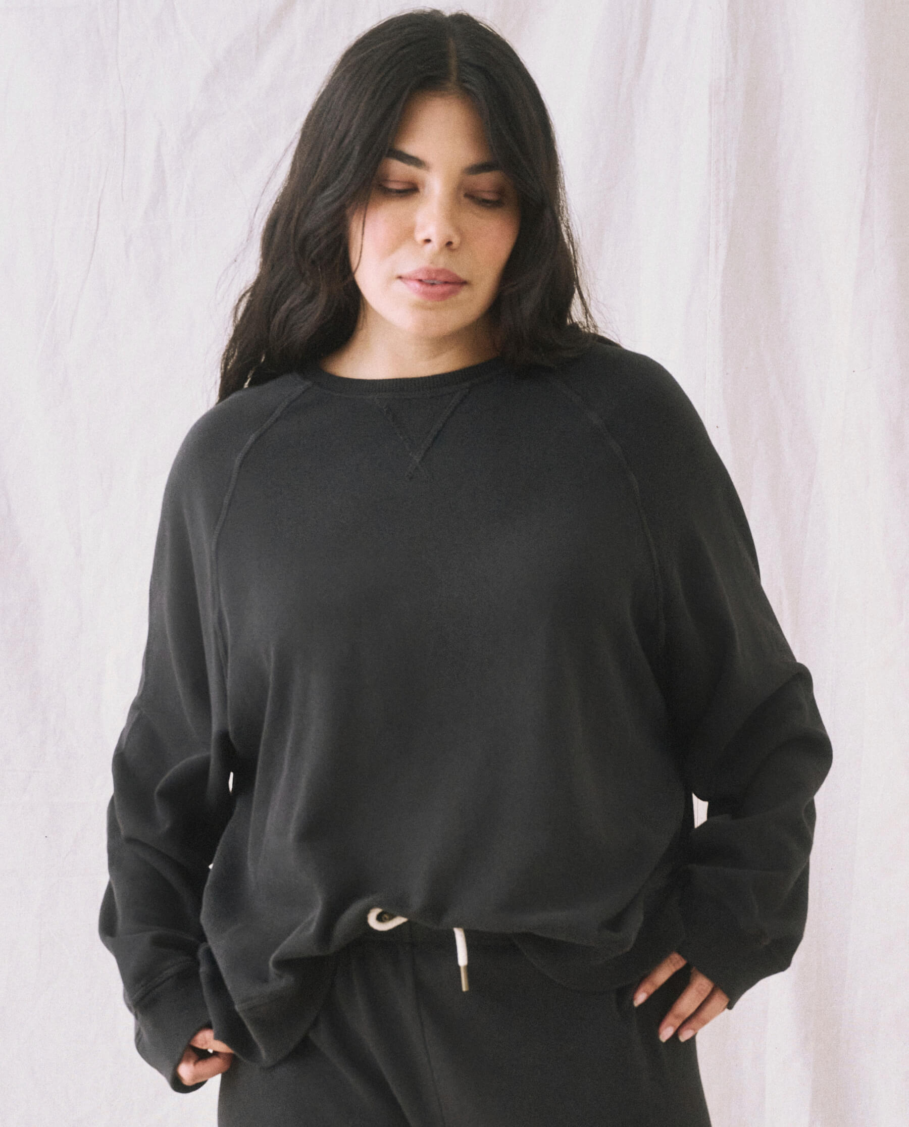 The Slouch Sweatshirt. Solid -- Almost Black SWEATSHIRTS THE GREAT. CORE KNITS