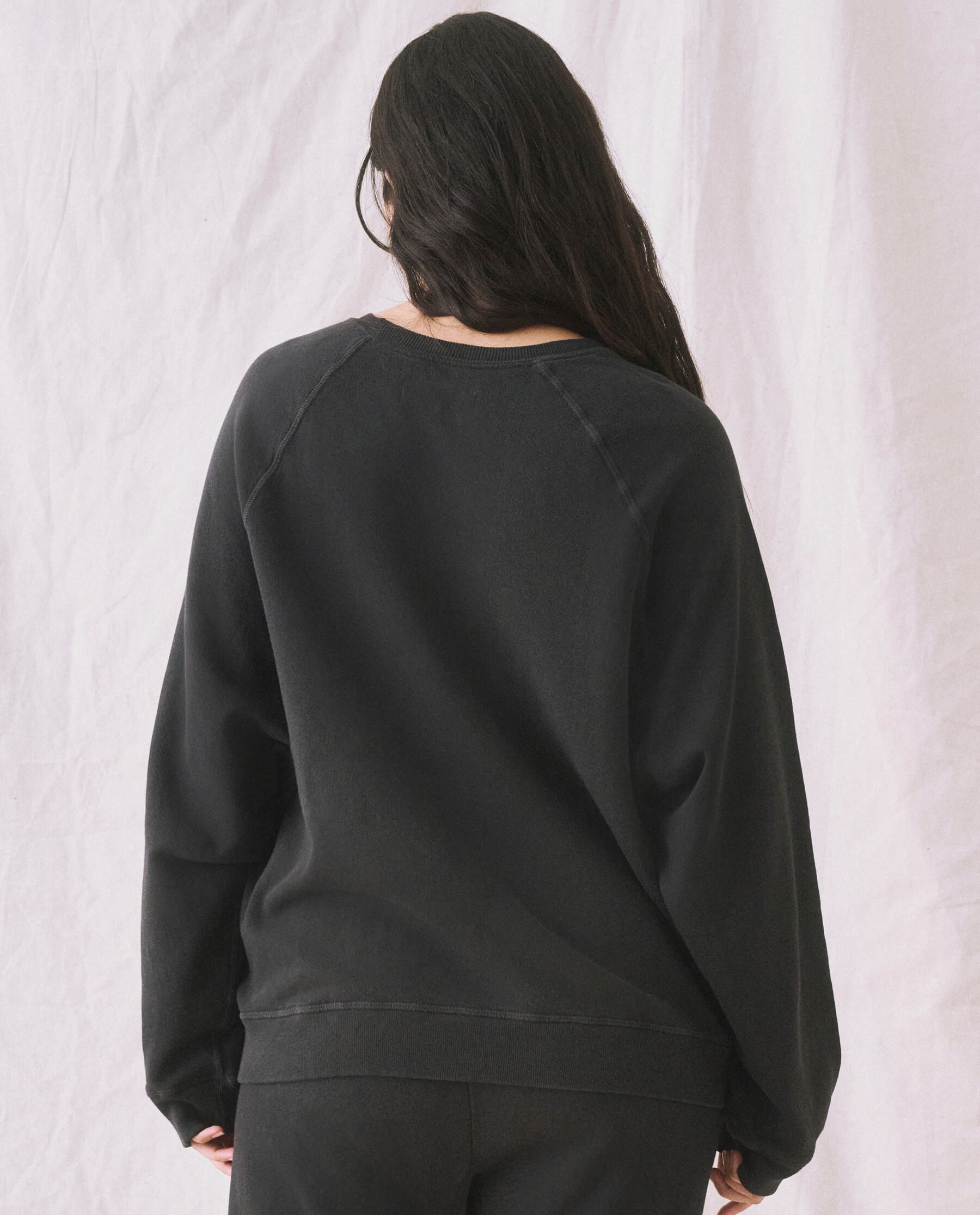 The Slouch Sweatshirt. Solid -- Almost Black SWEATSHIRTS THE GREAT. CORE KNITS