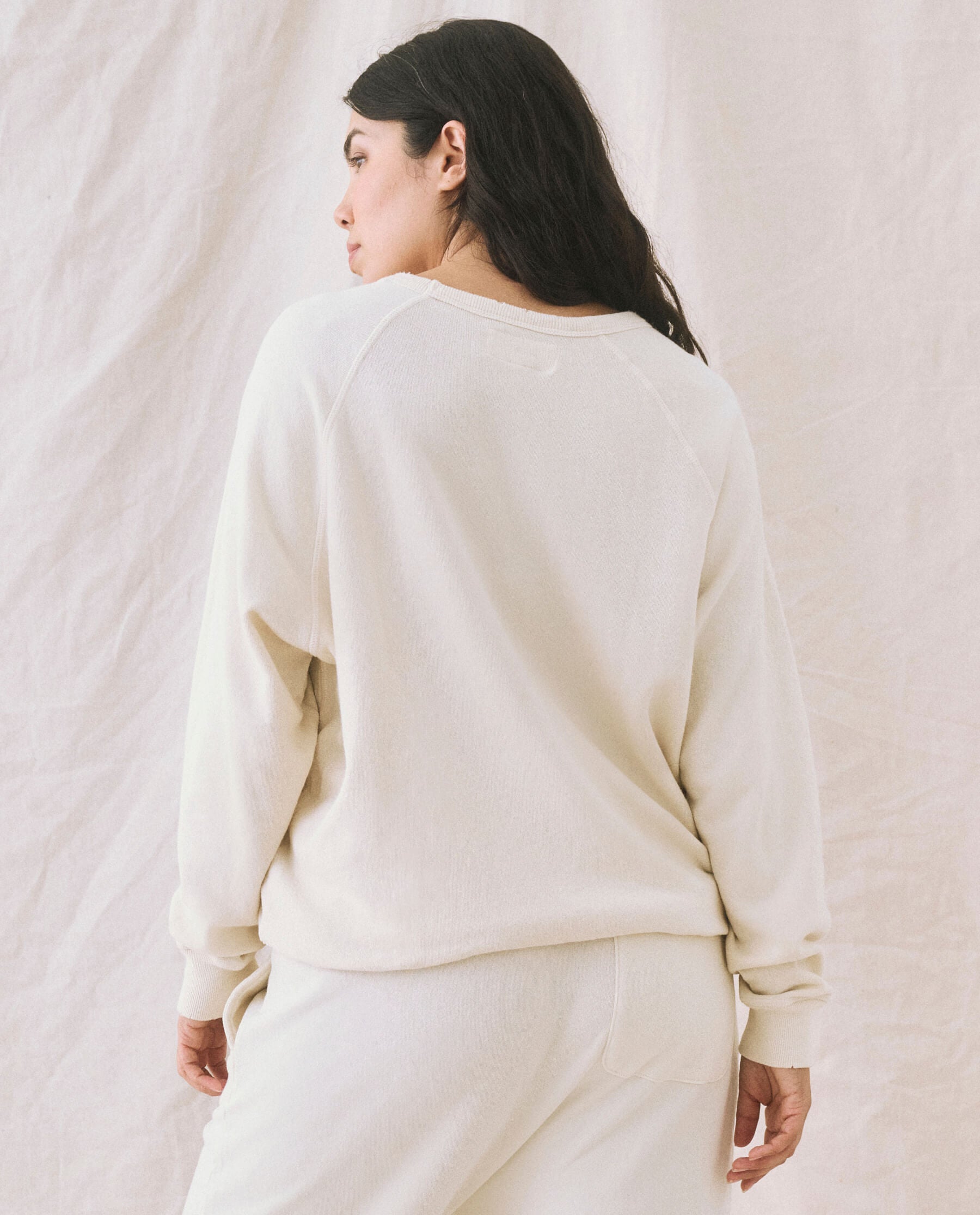 The College Sweatshirt. Solid -- Washed White SWEATSHIRTS THE GREAT. CORE KNITS