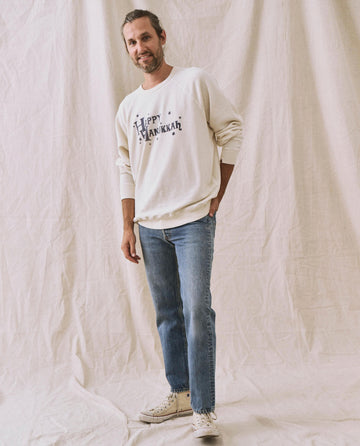 The Men's College Sweatshirt. -- Washed White with Hanukkah Graphic SWEATSHIRTS THE GREAT. HOLIDAY GRAPHICS MENS