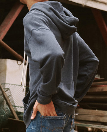 The Men's Gym Drawstring Hoodie. -- Washed Navy SWEATSHIRTS THE GREAT. SU22 MENS SALE