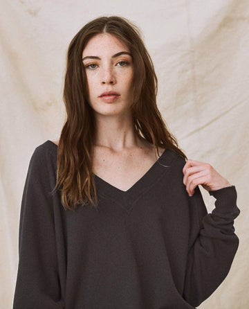 The V-Neck Sweatshirt. -- Washed Black SWEATSHIRTS THE GREAT. FALL21 KNITS